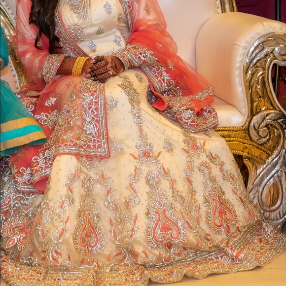 Beautiful wedding dress heavily embellished with crystal stones. Worn once. - Picture 1 of 6